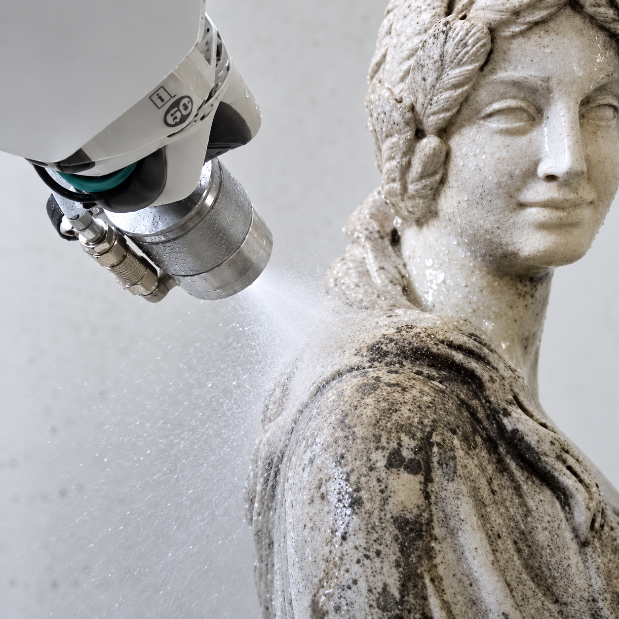 Controlled microblasting on a restoration detail with a FEVI microblasting machine